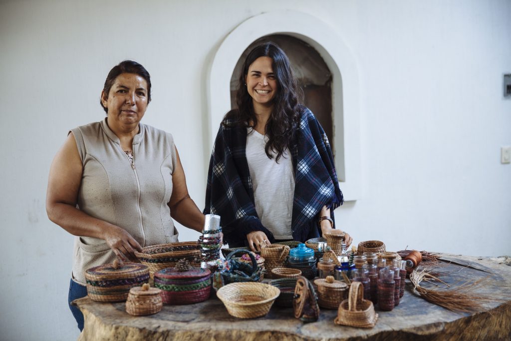 Marina Bañuelos makes handicrafts from pine leaves. She gathers the pine leaves, cooks them and weaves to create any type of vases, lamps, napkin holders and bracelets in Ejido Emiliano Zapata, Jalisco.