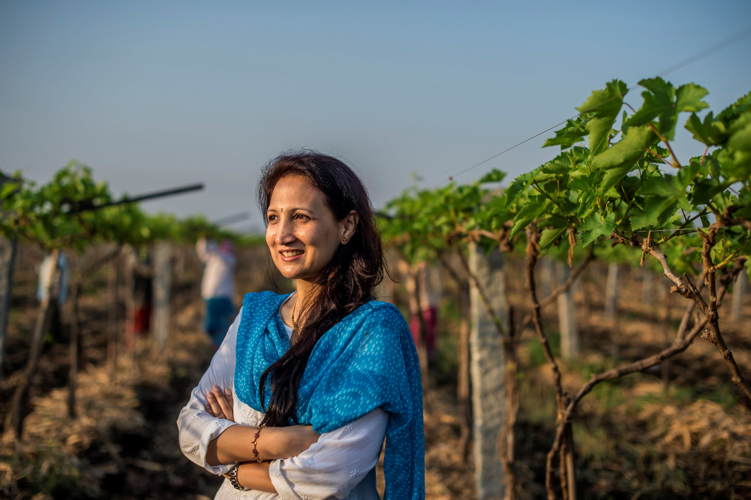 Nina Patil poses at her grape farm in India