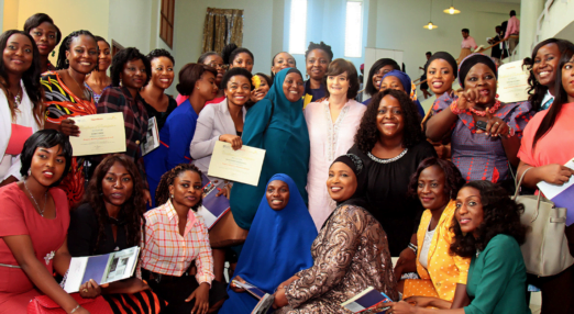 Cherie Blair poses with women entrepreneurs in Nigeria