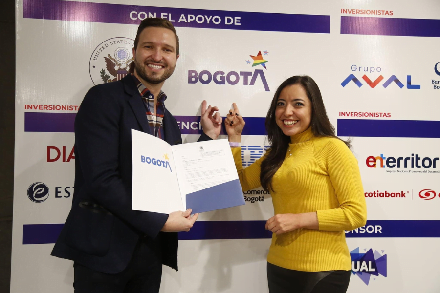 Colombian LGBT Chamber of Commerce staff poses with an award