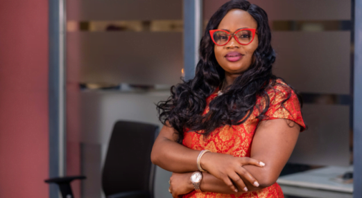 Sola Adesakin poses at her business, Smart Stewards