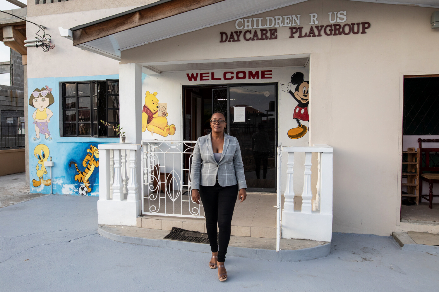 Carlotta John, a participant in the Road to Growth program outside of her childcare centre in Guyana