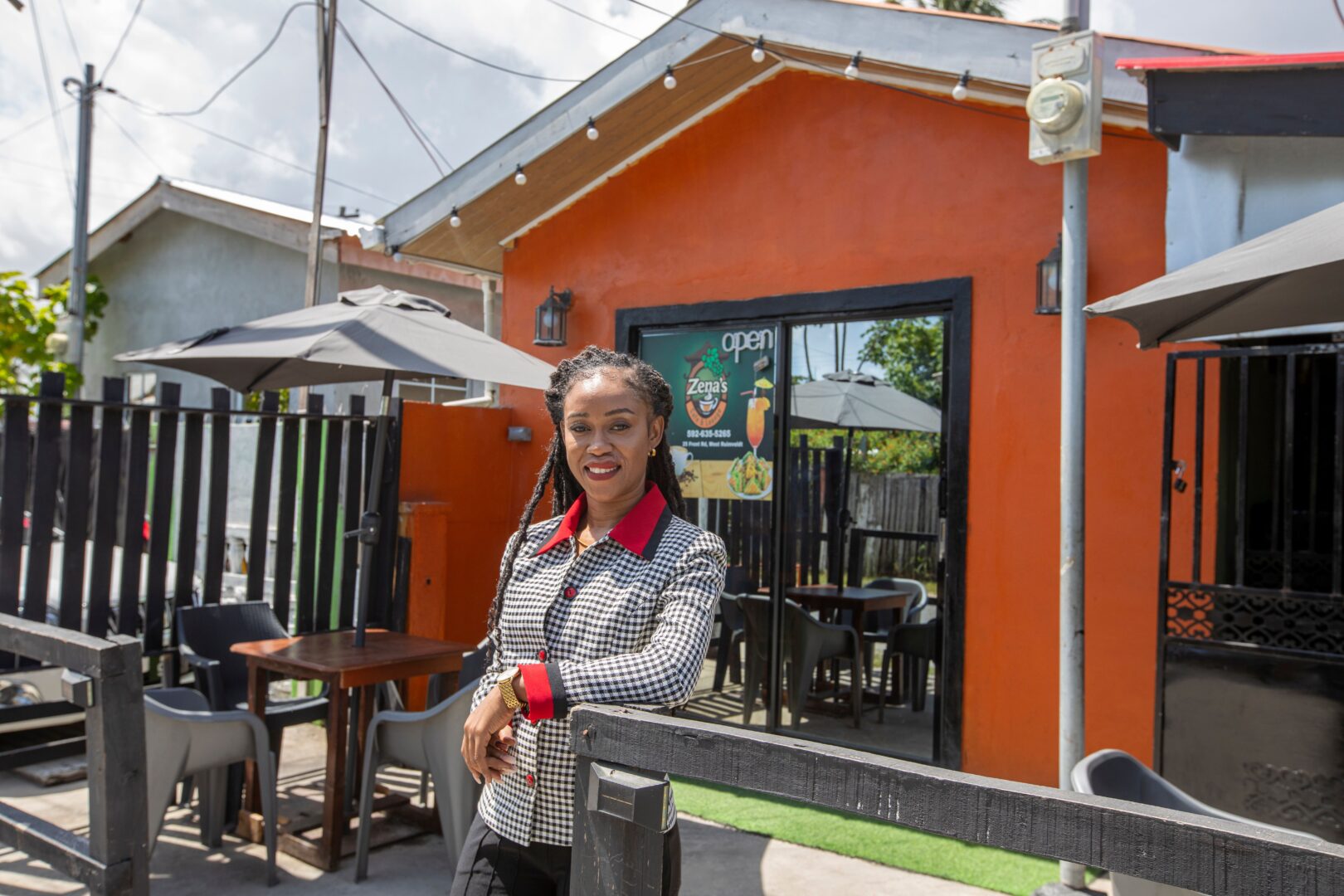 Charlyn Miller, stood outside a cafe, smiling